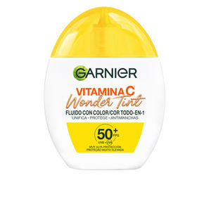 Face moisturizer - Anti blemish treatment Garnier Obarvan fluid z vitaminom C Wonder in barvnim SPF50+ kupite na spletu